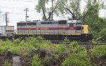 NS 1700 stands idle on a rainy Sunday with its ballast cars